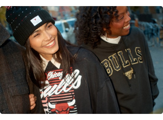 People wearing Chicago Bulls apparel