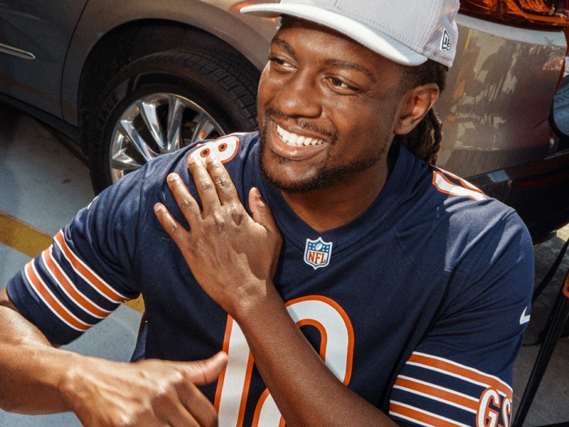 Fan in a Chicago Bears jersey and cap