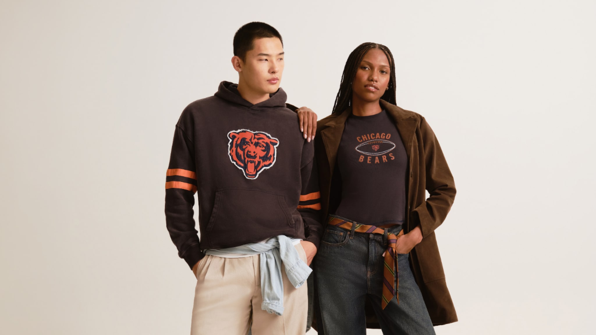 Two models in brown Chicago Bears fleece and tee