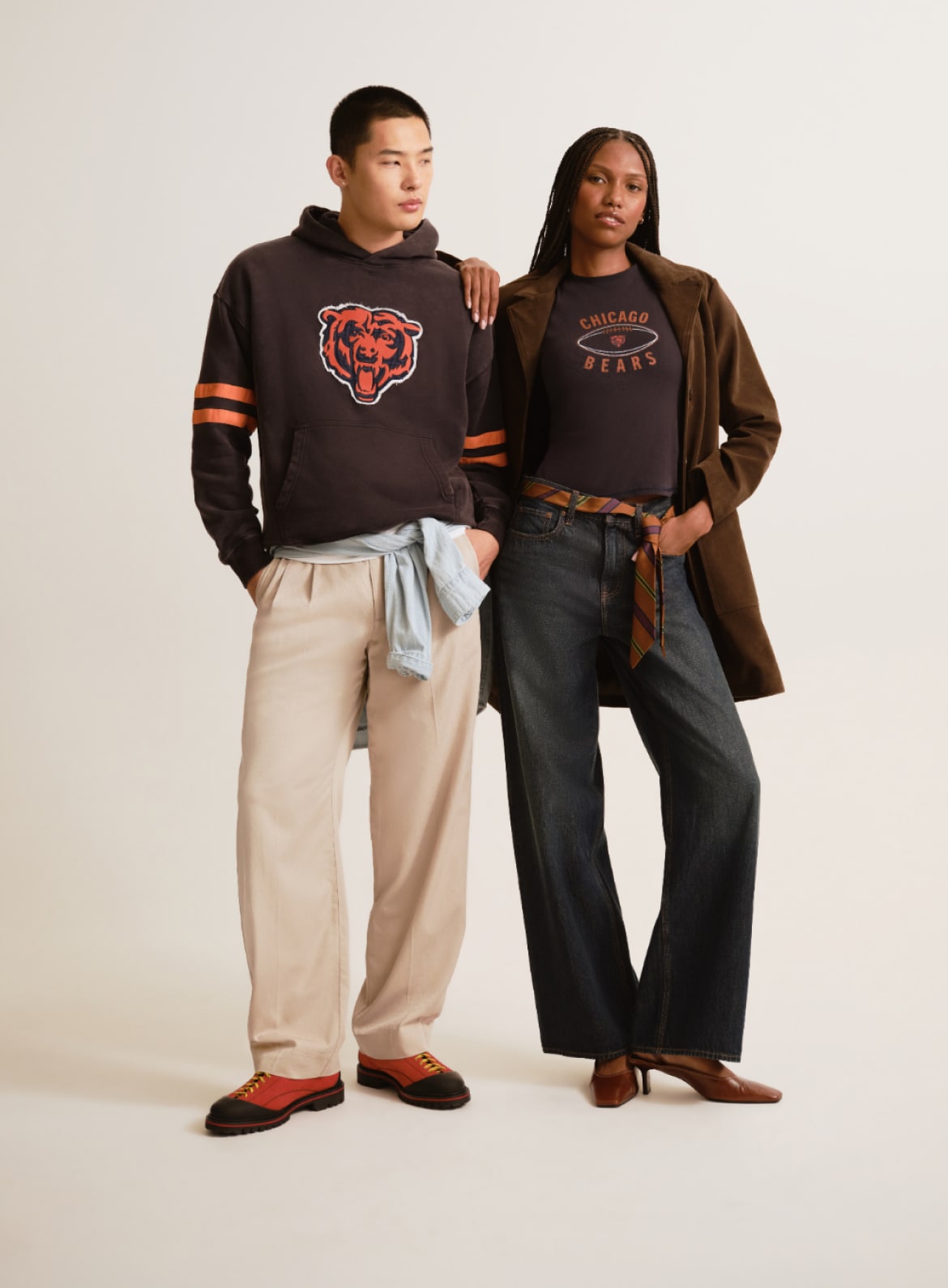 Two models in brown Chicago Bears fleece and tee